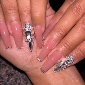Elegant Nude Nail Polish with Silver Accents